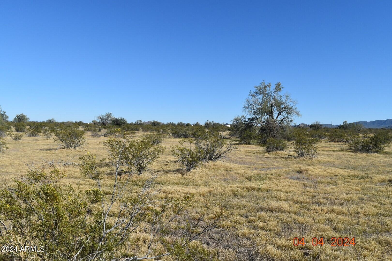 524-xx West Organ Pipe Road, Unit B Maricopa, AZ 85139 - Photo 7 of 9 a view of a sky from a yard