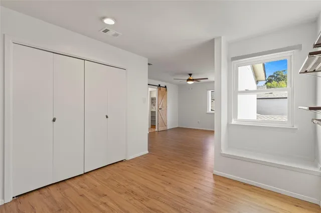 a view of entryway with wooden floor