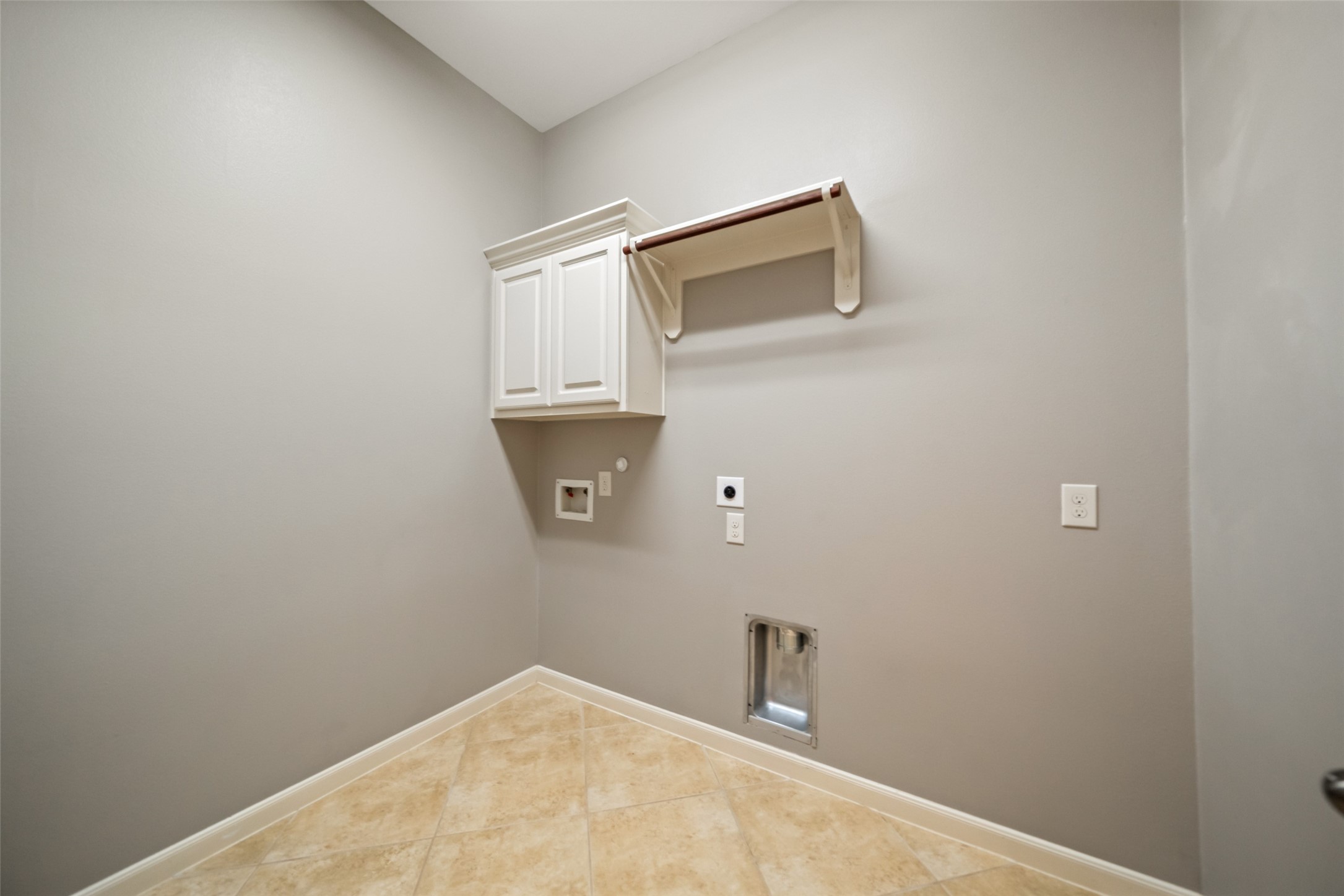 2818 Red Maple Drive Katy, TX 77494 - Photo 20 of 50 a view of a small space with wooden floor and cabinet