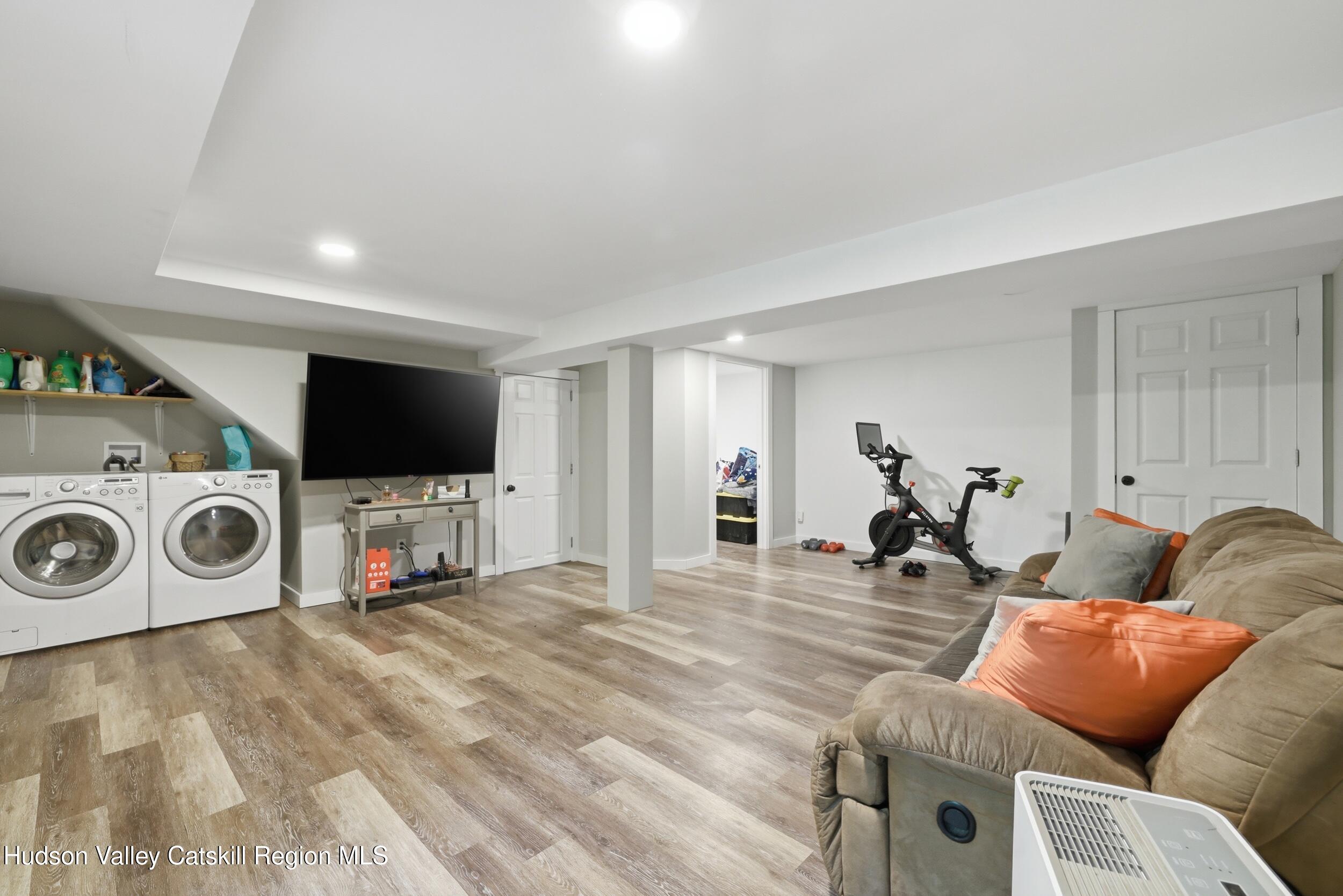 186 Cedar Hill Road High Falls, NY 12440 - Photo 23 of 33 a living room with furniture and a flat screen tv