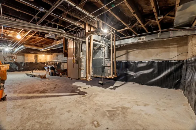 a view of parking garage with cars