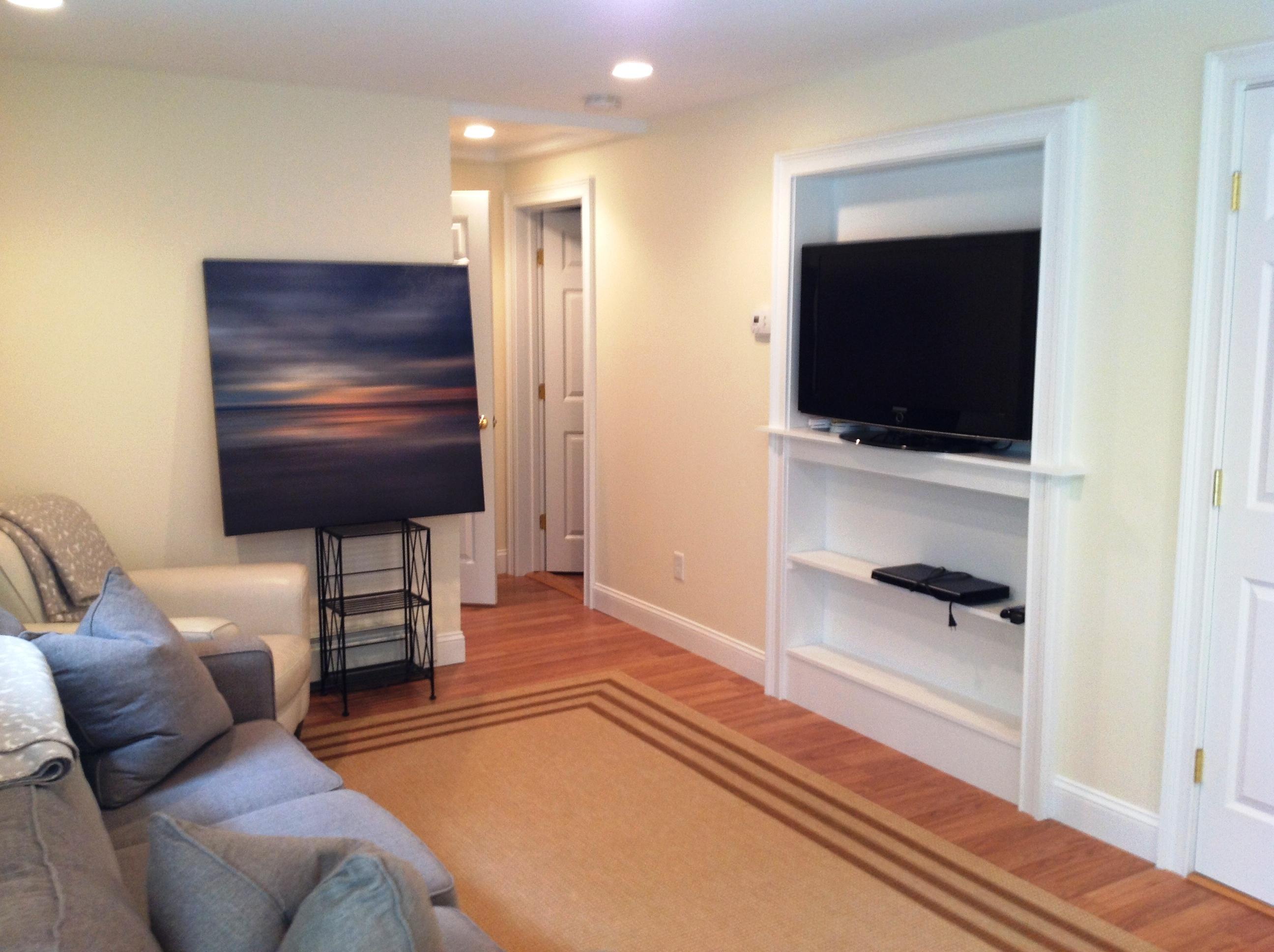 26 Brooks Road Monument Beach, MA 02532 - Photo 7 of 22 Basement Family Room with Built Ins