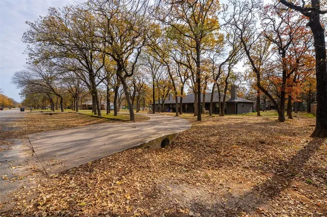 a view of road with trees