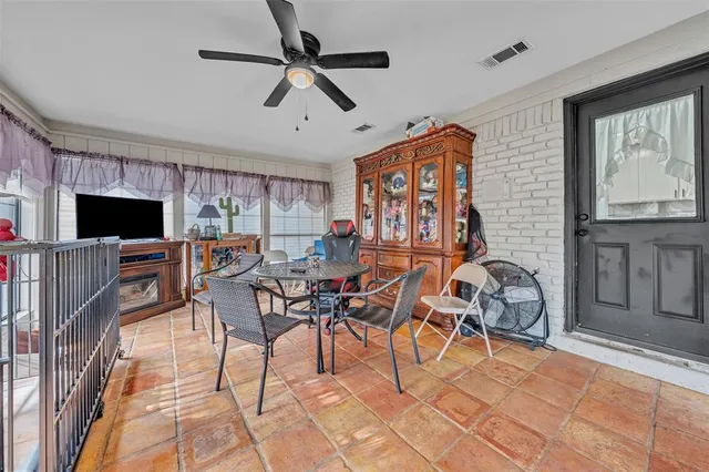 a view of a livingroom with furniture and a flat screen tv