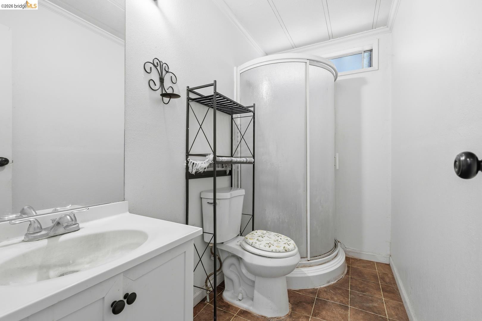 8200 Jantzen Road Modesto, CA 95357 - Photo 5 of 6 a bathroom with a sink a toilet and shower