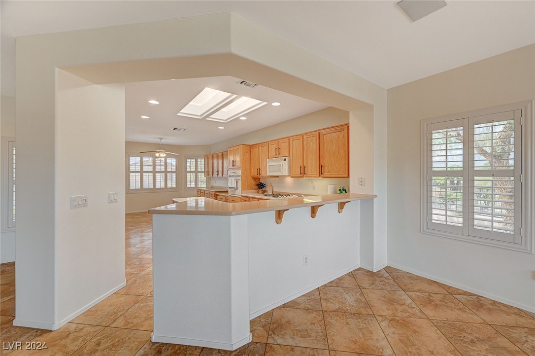 3054 Fort Stanwix Road Henderson, NV 89052 - Photo 15 of 52 Kitchen overlooks great room