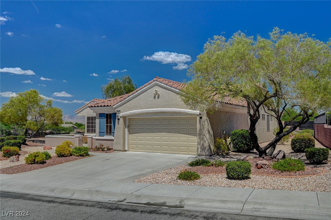 3054 Fort Stanwix Road Henderson, NV 89052 - Photo 2 of 52 Situated on a large elevated corner lot