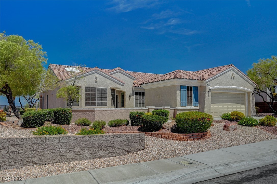 3054 Fort Stanwix Road Henderson, NV 89052 - Photo 3 of 52 courtyard perfect for enjoying morning coffee