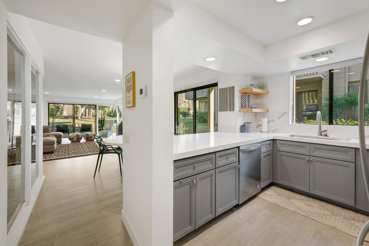 46644 Arapahoe, Unit A Indian Wells, CA 92210 - Photo 12 of 29 a large white kitchen with a large window