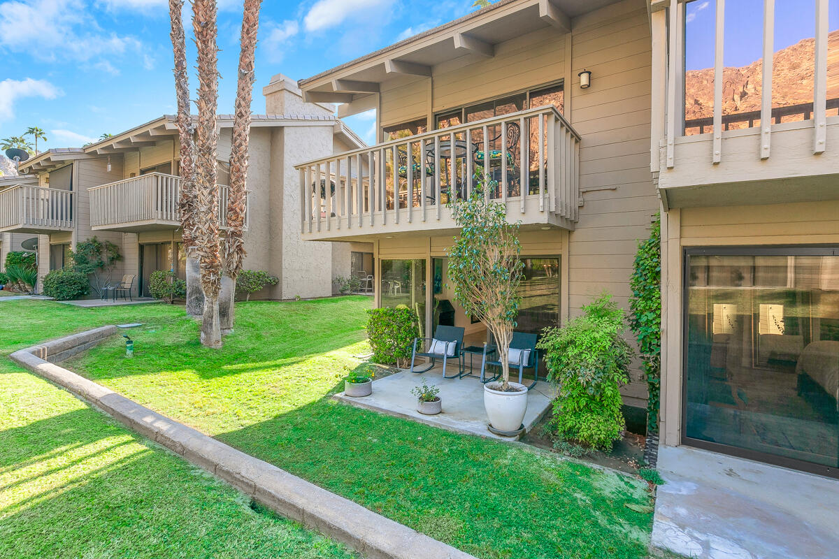 46644 Arapahoe, Unit A Indian Wells, CA 92210 - Photo 23 of 29 a front view of a building with garden