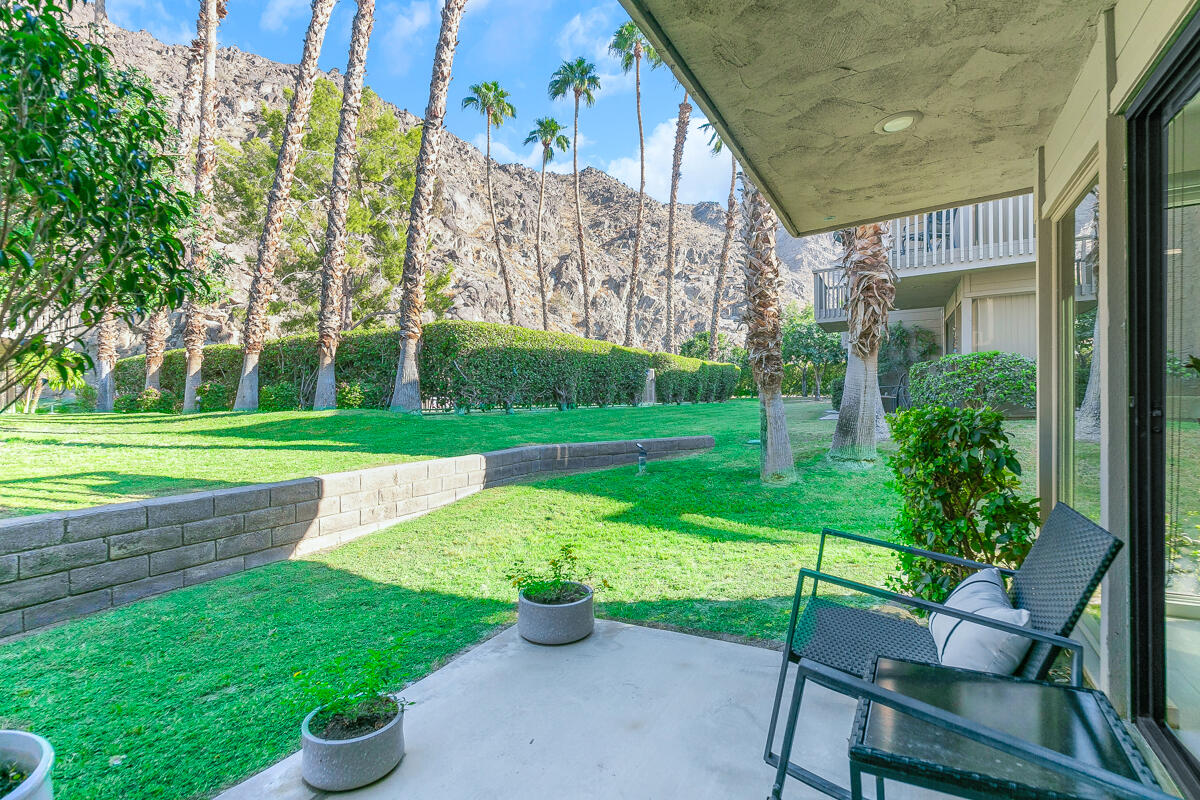 46644 Arapahoe, Unit A Indian Wells, CA 92210 - Photo 27 of 29 a view of a chair and table in the garden