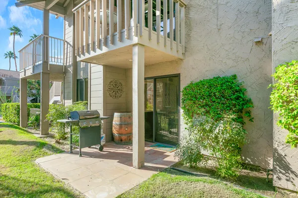 a view of a building with a garden