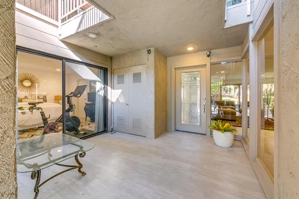 a view of a hallway with workspace