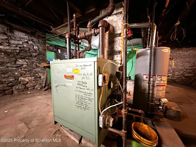 a utility room with lots of clutter