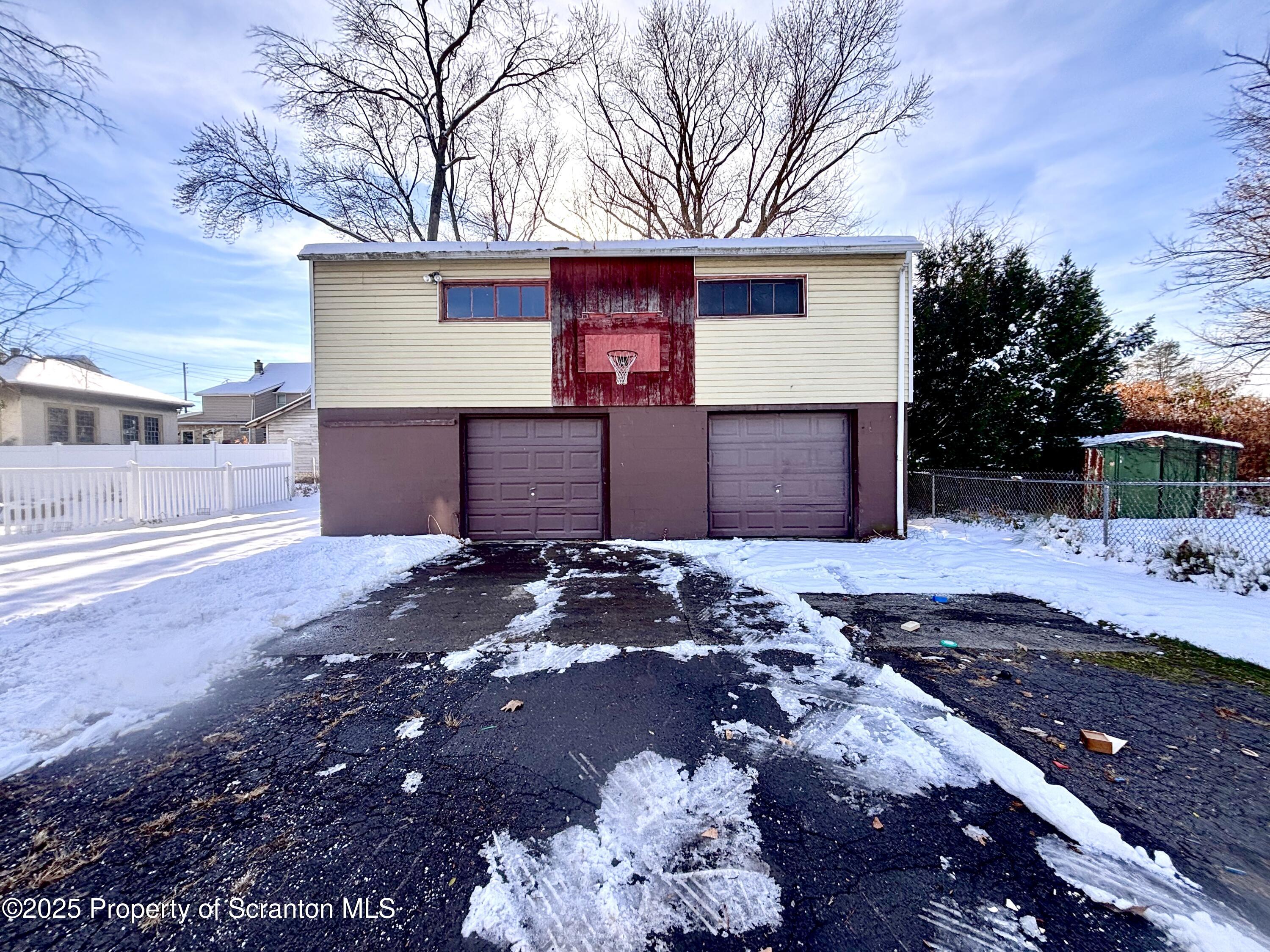 514 East Market Street Scranton, PA 18509 - Photo 30 of 33 a front view of a house with a yard