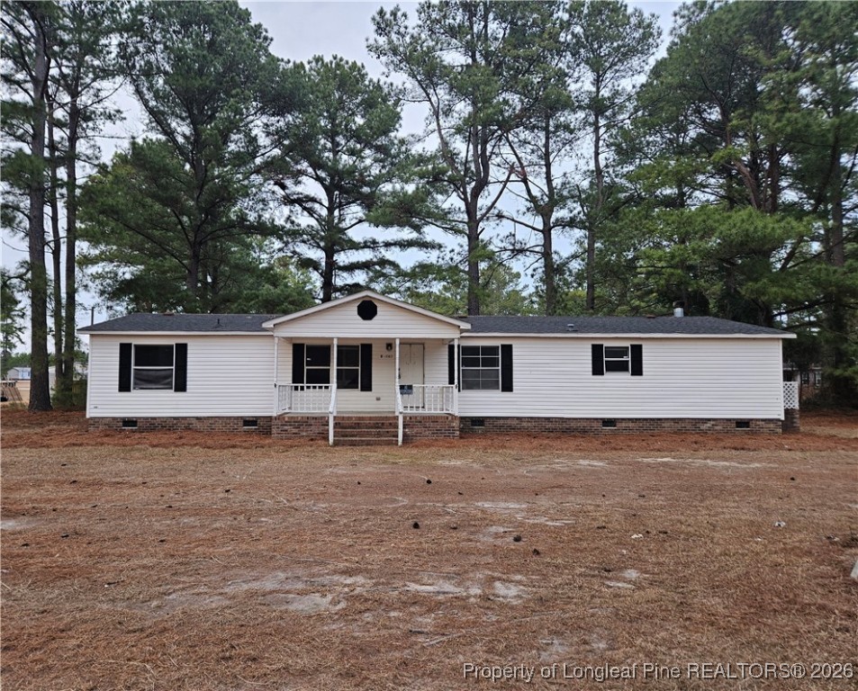 a house with trees in front of it