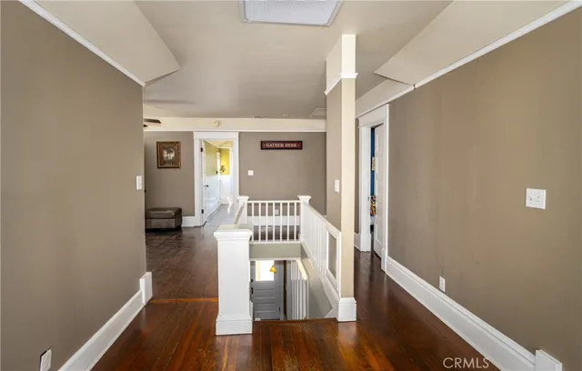 a view of entryway with wooden floor