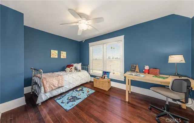 a room with furniture and a wooden floor