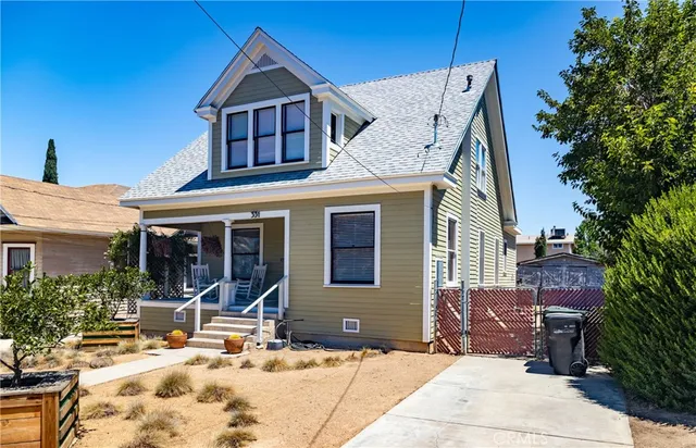 a view of a house with chairs in patio