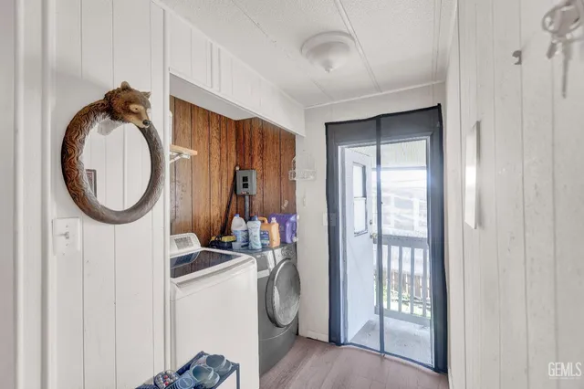 a storage room with wooden floor and furniture