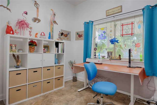 a bathroom with a sink vanity granite and a mirror