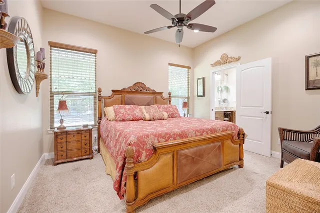 a view of walk in closet with clothes