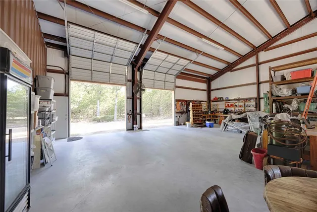 a view of a backyard with sitting area