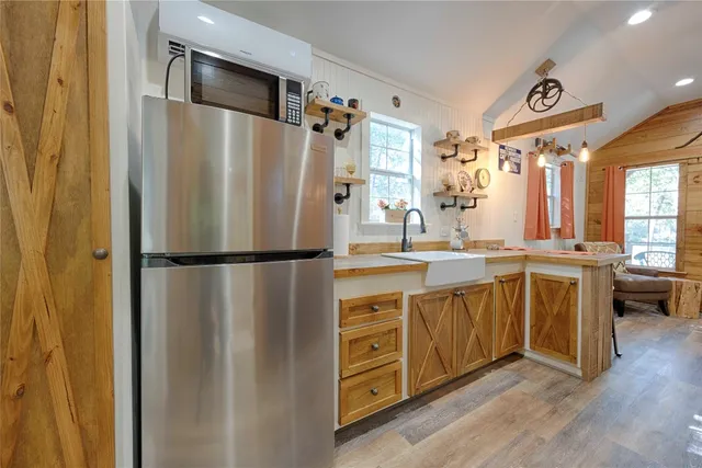 a bathroom with a sink and mirror