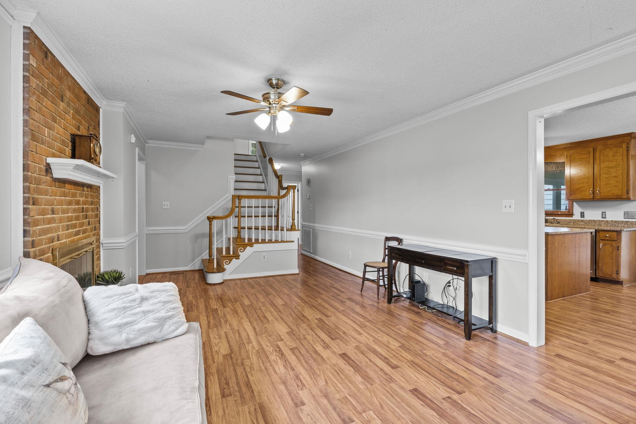 119 Lakeside Circle Willow Spring, NC 27592 - Photo 12 of 37 a view of a livingroom with furniture and wooden floor