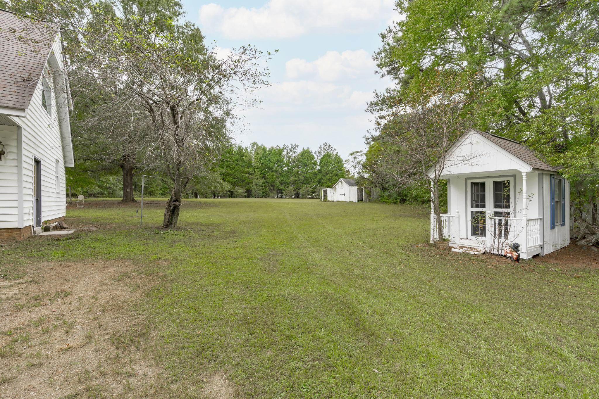 119 Lakeside Circle Willow Spring, NC 27592 - Photo 30 of 37 a view of a house with a yard