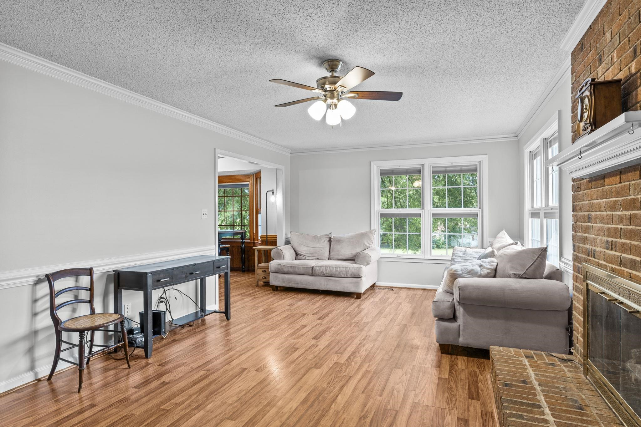 119 Lakeside Circle Willow Spring, NC 27592 - Photo 3 of 37 a living room with furniture and a large window
