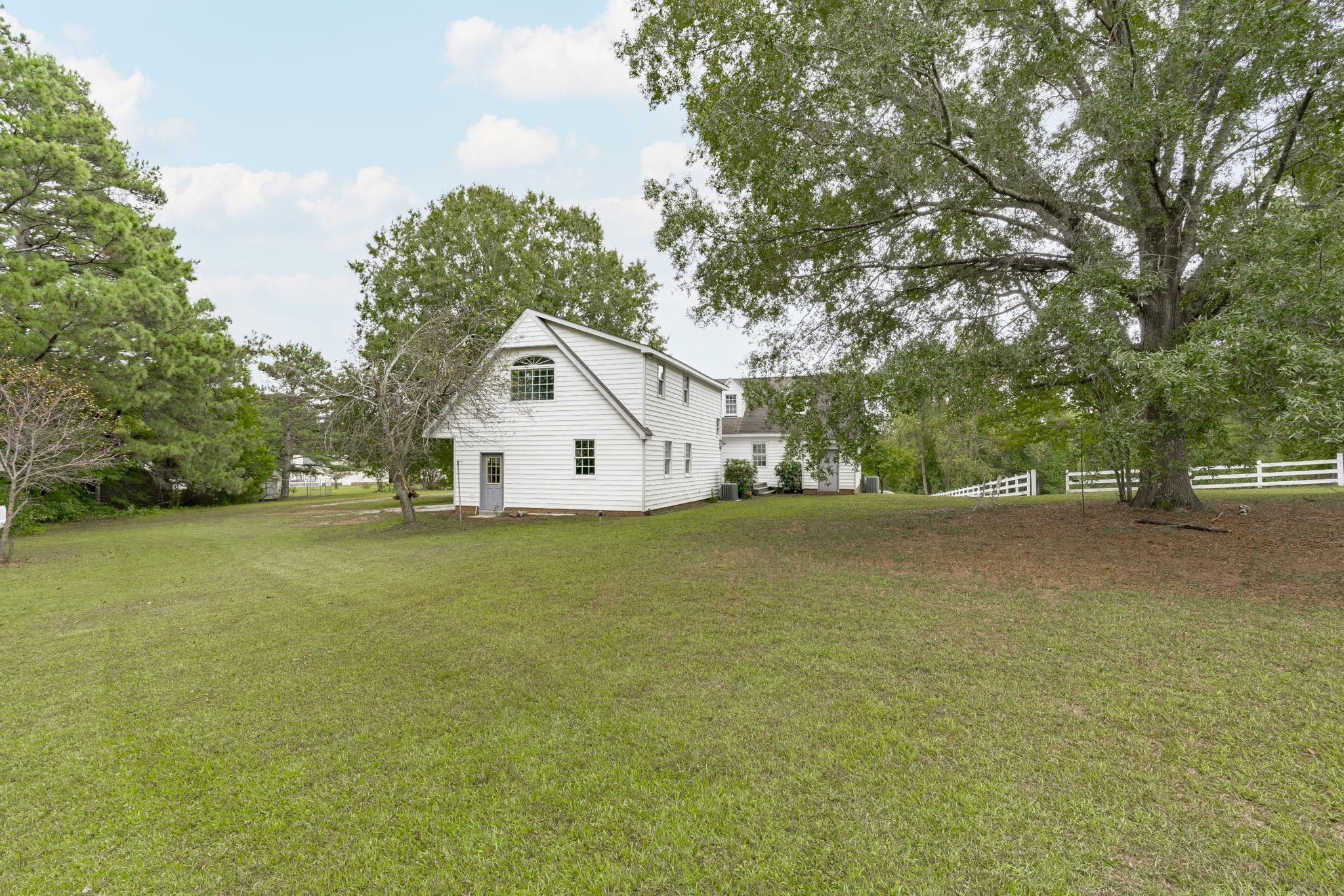 119 Lakeside Circle Willow Spring, NC 27592 - Photo 31 of 37 a view of a house with a yard