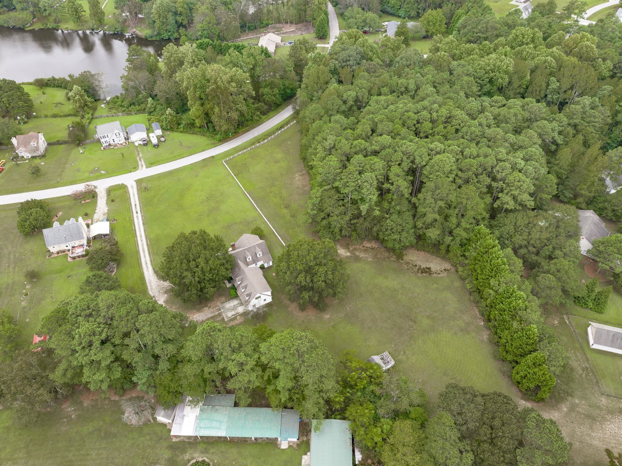 119 Lakeside Circle Willow Spring, NC 27592 - Photo 34 of 37 a view of a lake from a balcony