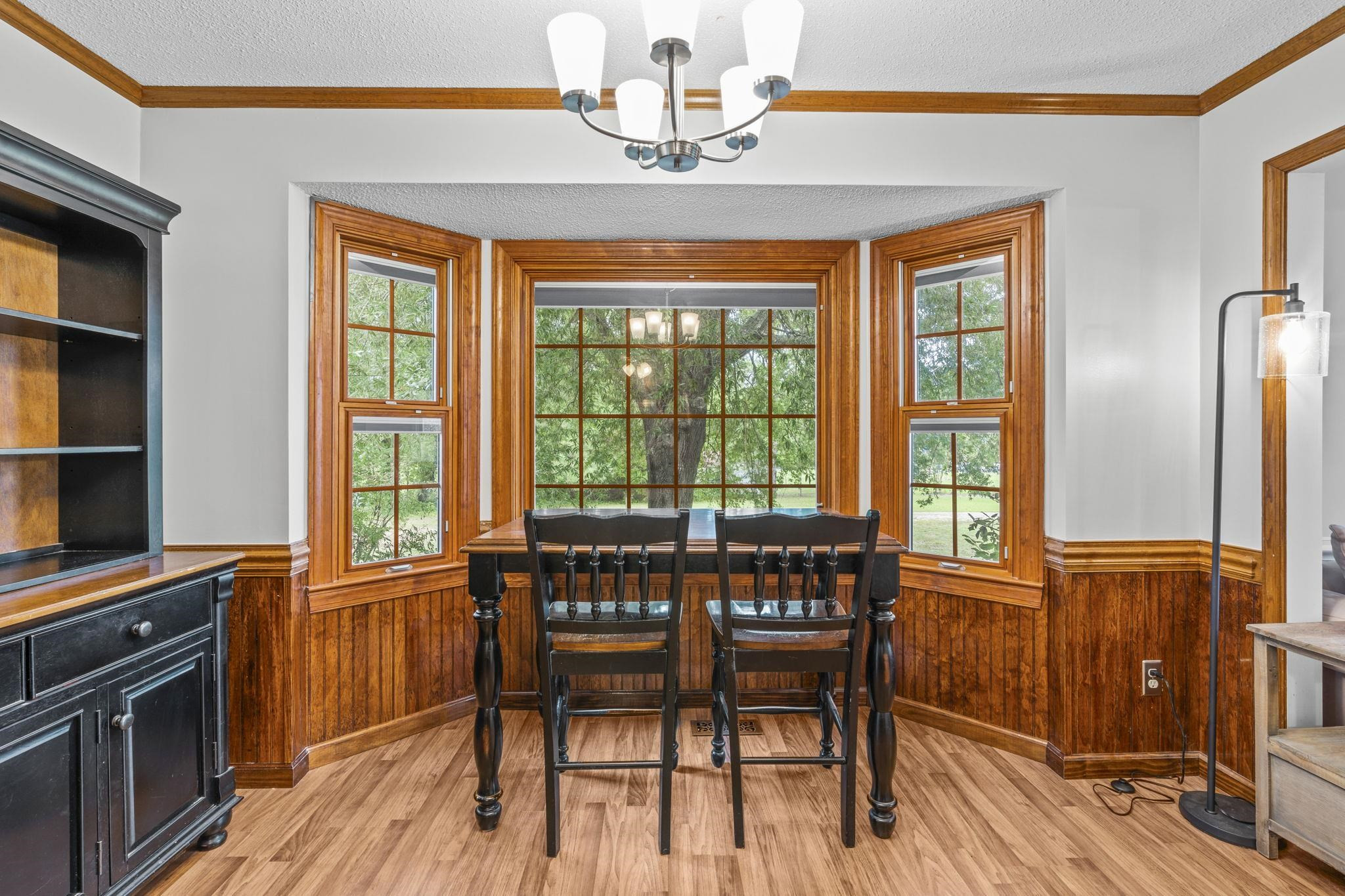 119 Lakeside Circle Willow Spring, NC 27592 - Photo 10 of 37 a view of a dining room with furniture window and wooden floor