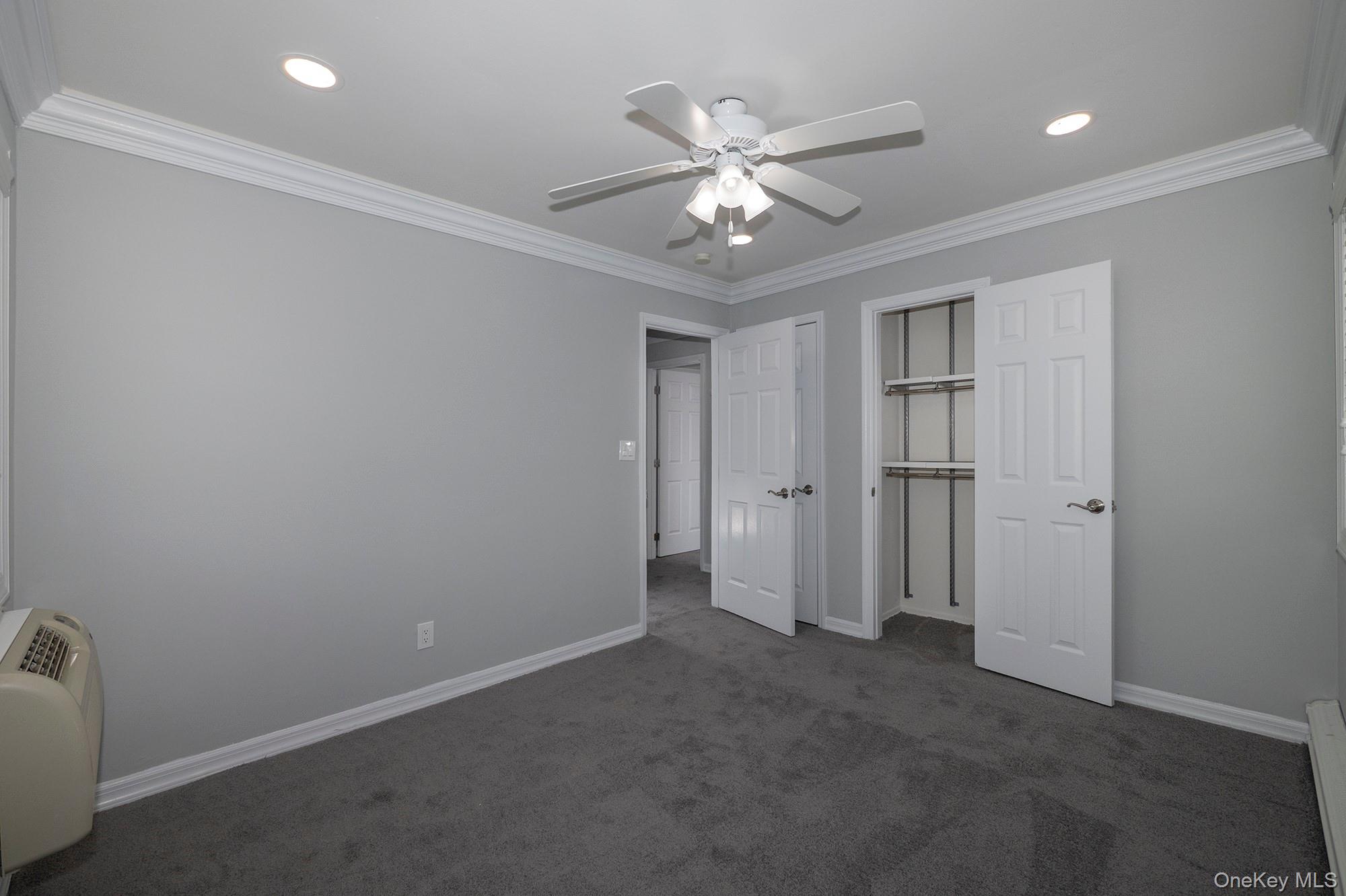 55 Fairfield Way, Unit HE03 Commack, NY 11725 - Photo 8 of 9 a view of an empty room
