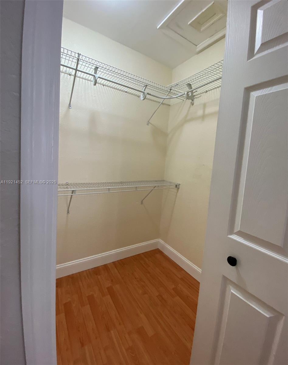 7880 Southwest 14th Terrace Miami, FL 33144 - Photo 19 of 43 a view of a room with empty racks