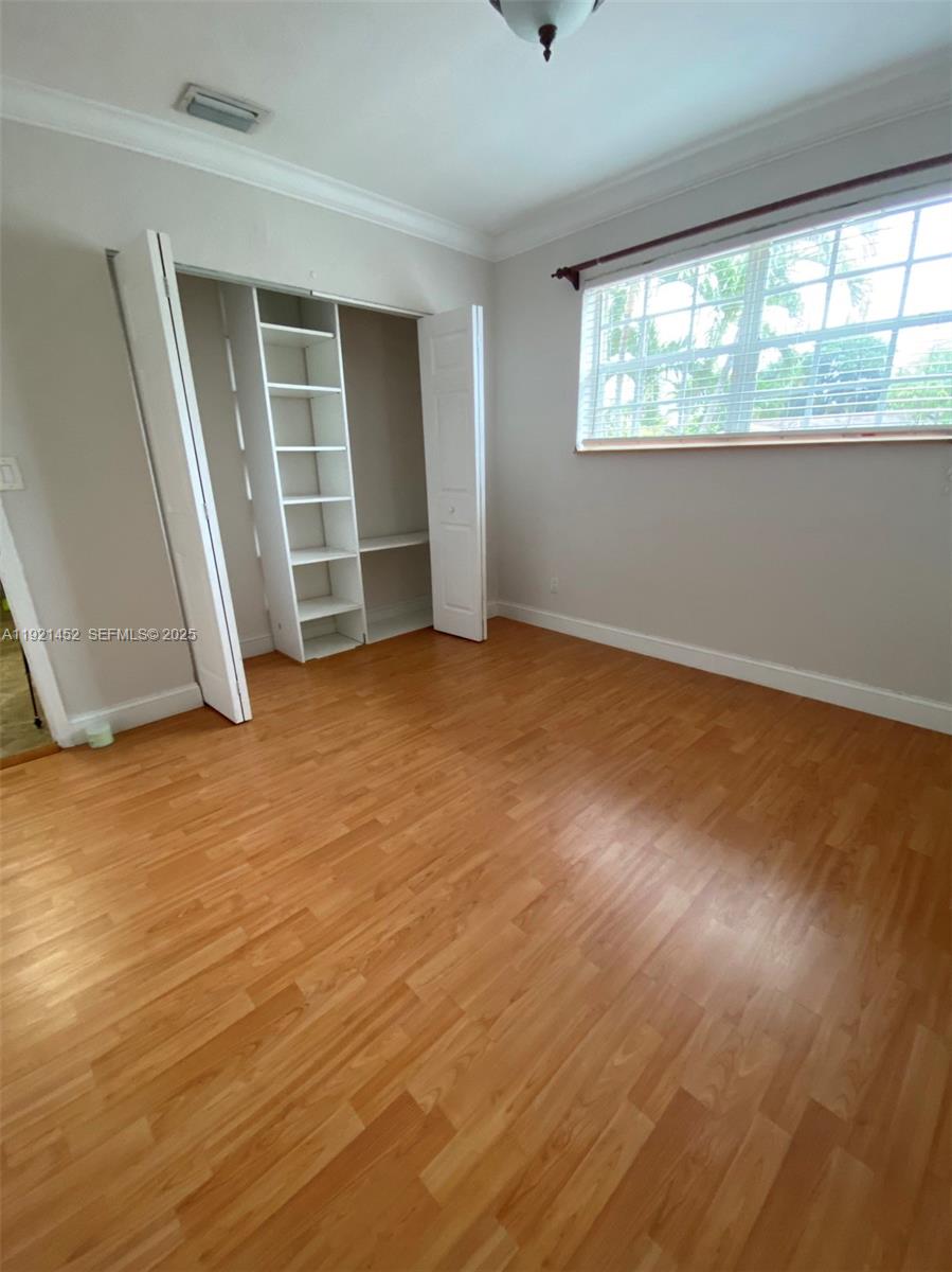 7880 Southwest 14th Terrace Miami, FL 33144 - Photo 21 of 43 an empty room with windows