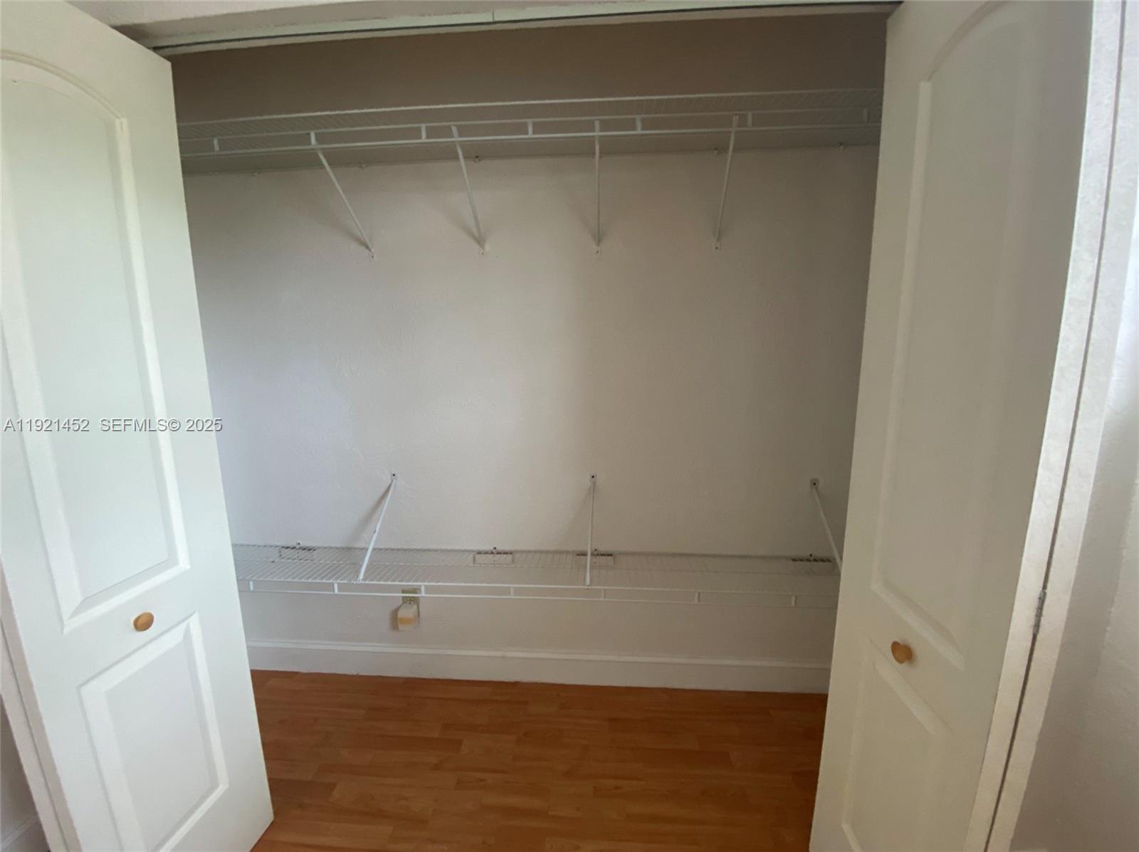 7880 Southwest 14th Terrace Miami, FL 33144 - Photo 23 of 43 a view of walk in closet