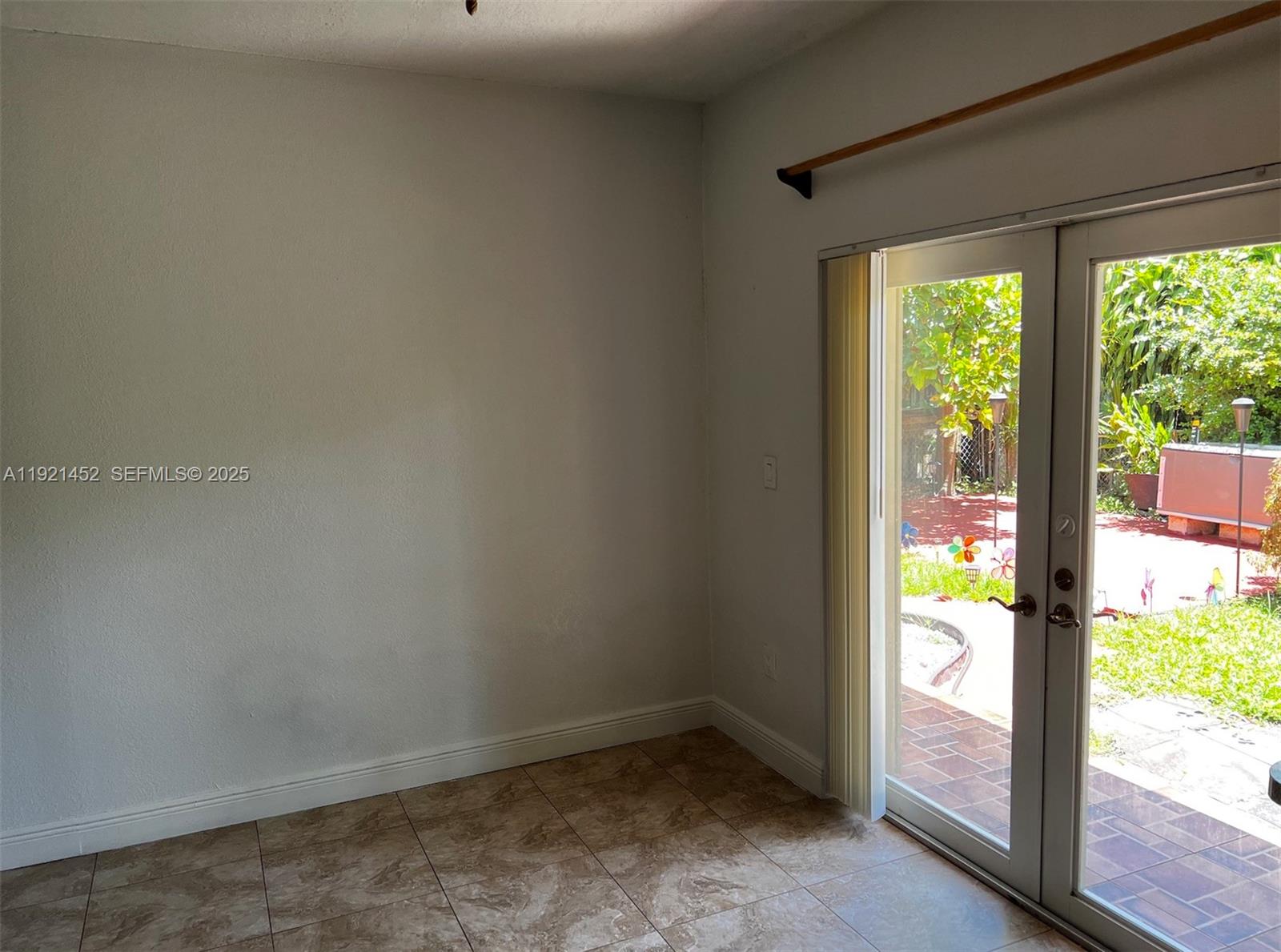 7880 Southwest 14th Terrace Miami, FL 33144 - Photo 33 of 43 a view of an empty room and window