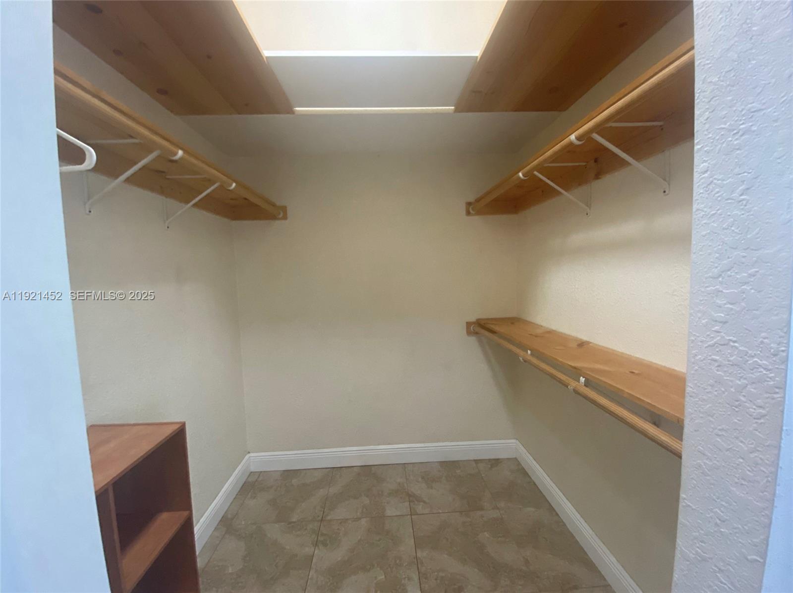 7880 Southwest 14th Terrace Miami, FL 33144 - Photo 41 of 43 a view of a room with racks on the wall