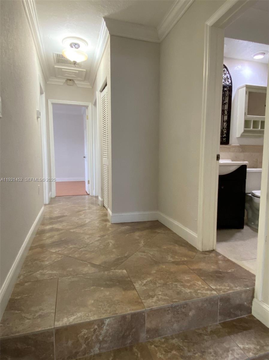 7880 Southwest 14th Terrace Miami, FL 33144 - Photo 10 of 43 a view of a big room with closet and a mirror