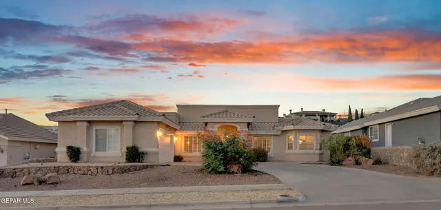 a front view of a house with a porch