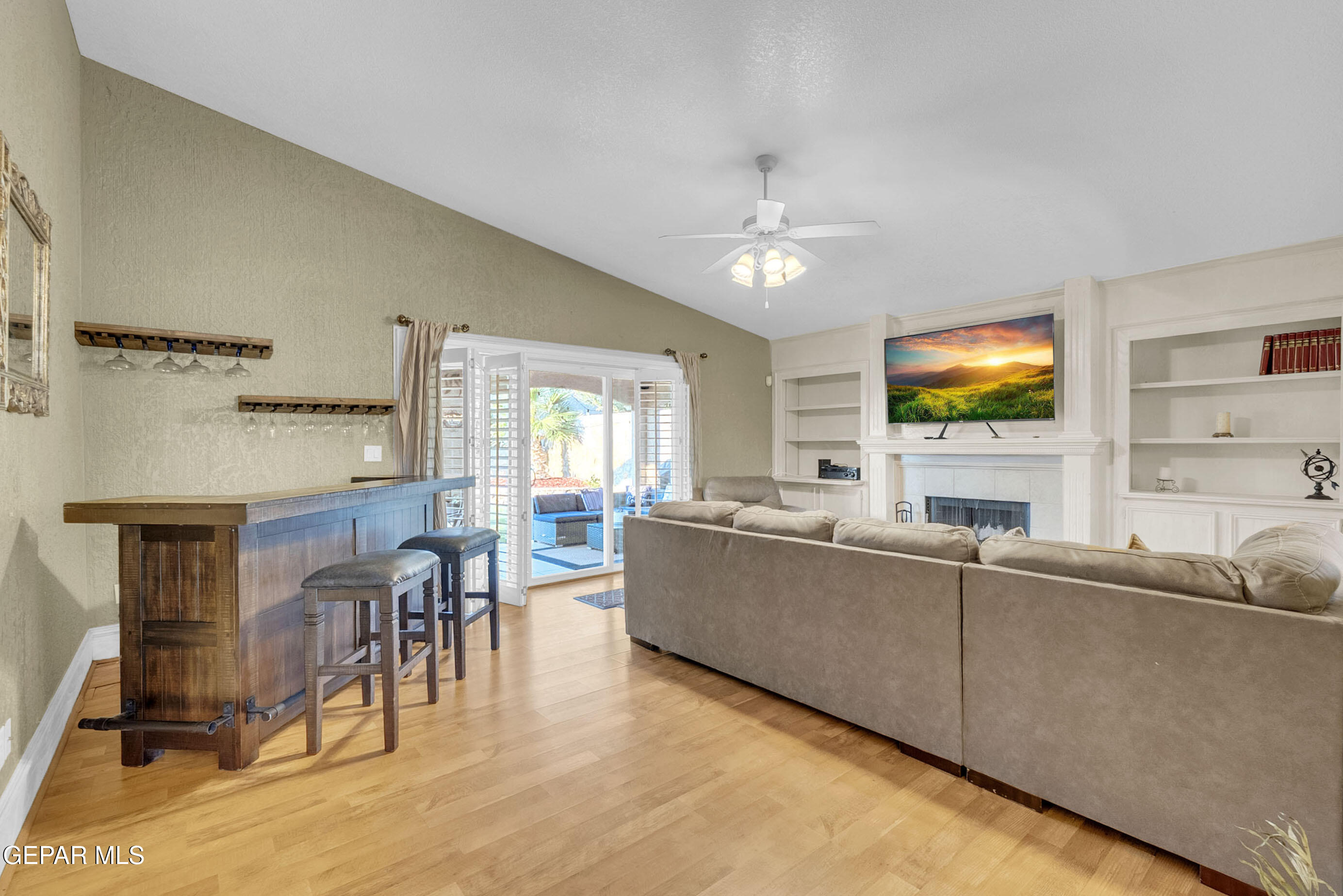 6531 Brook Ridge Circle El Paso, TX 79912 - Photo 13 of 73 a living room with furniture and a flat screen tv