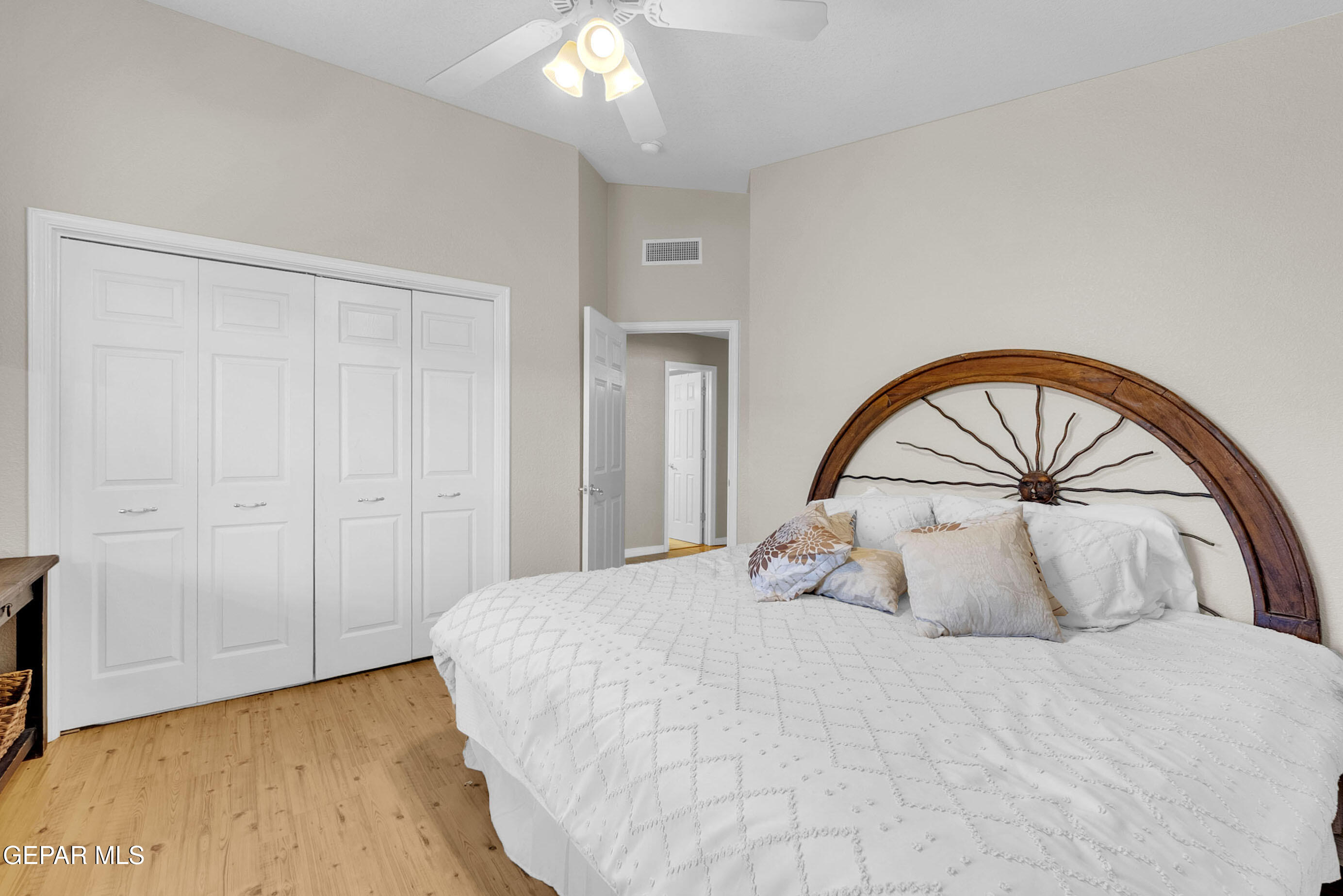 6531 Brook Ridge Circle El Paso, TX 79912 - Photo 48 of 73 a bedroom with a large bed and a large window