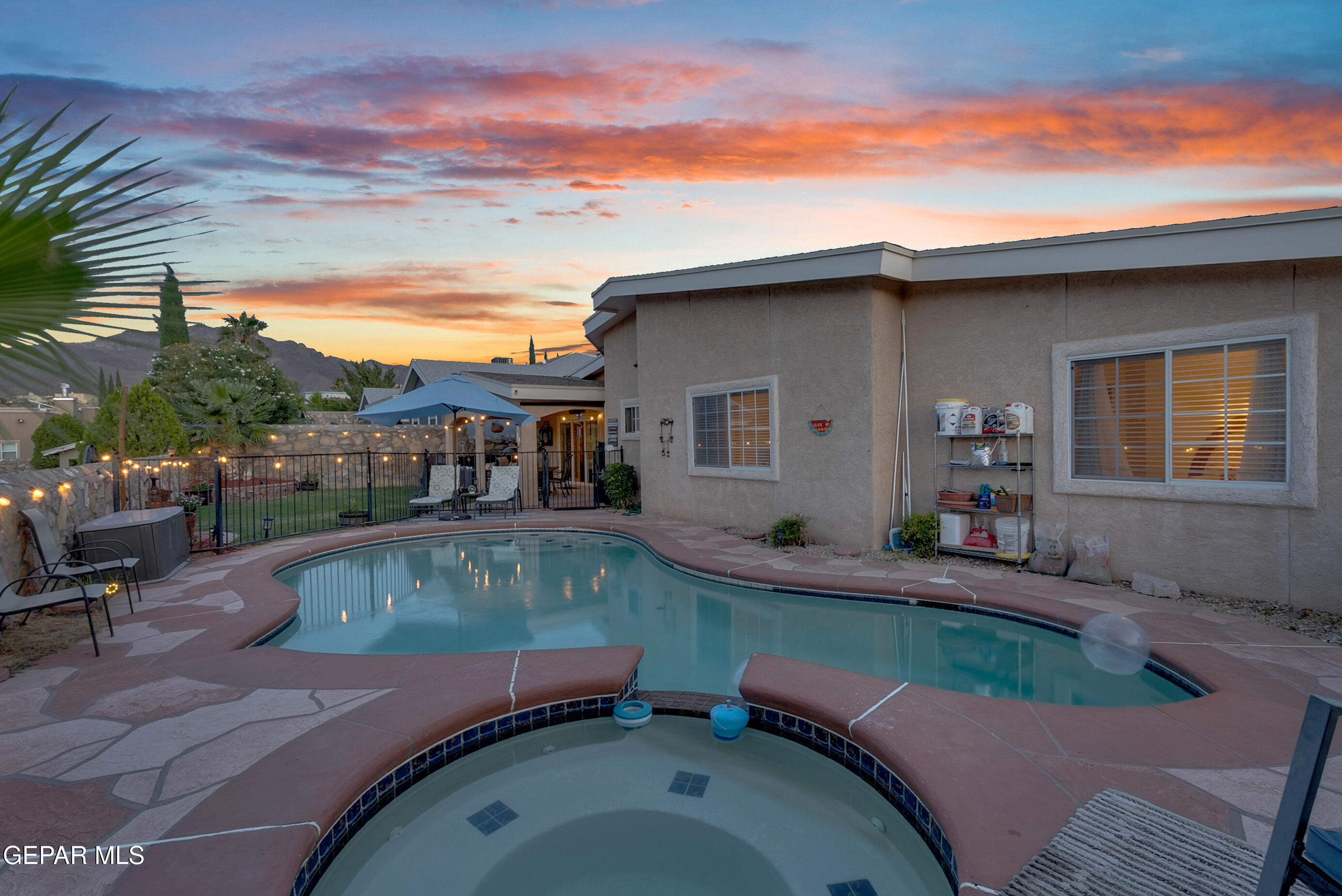 6531 Brook Ridge Circle El Paso, TX 79912 - Photo 63 of 73 a view of a house with swimming pool and sitting area