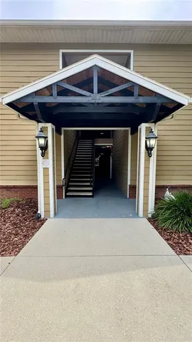 a front view of a house with garage
