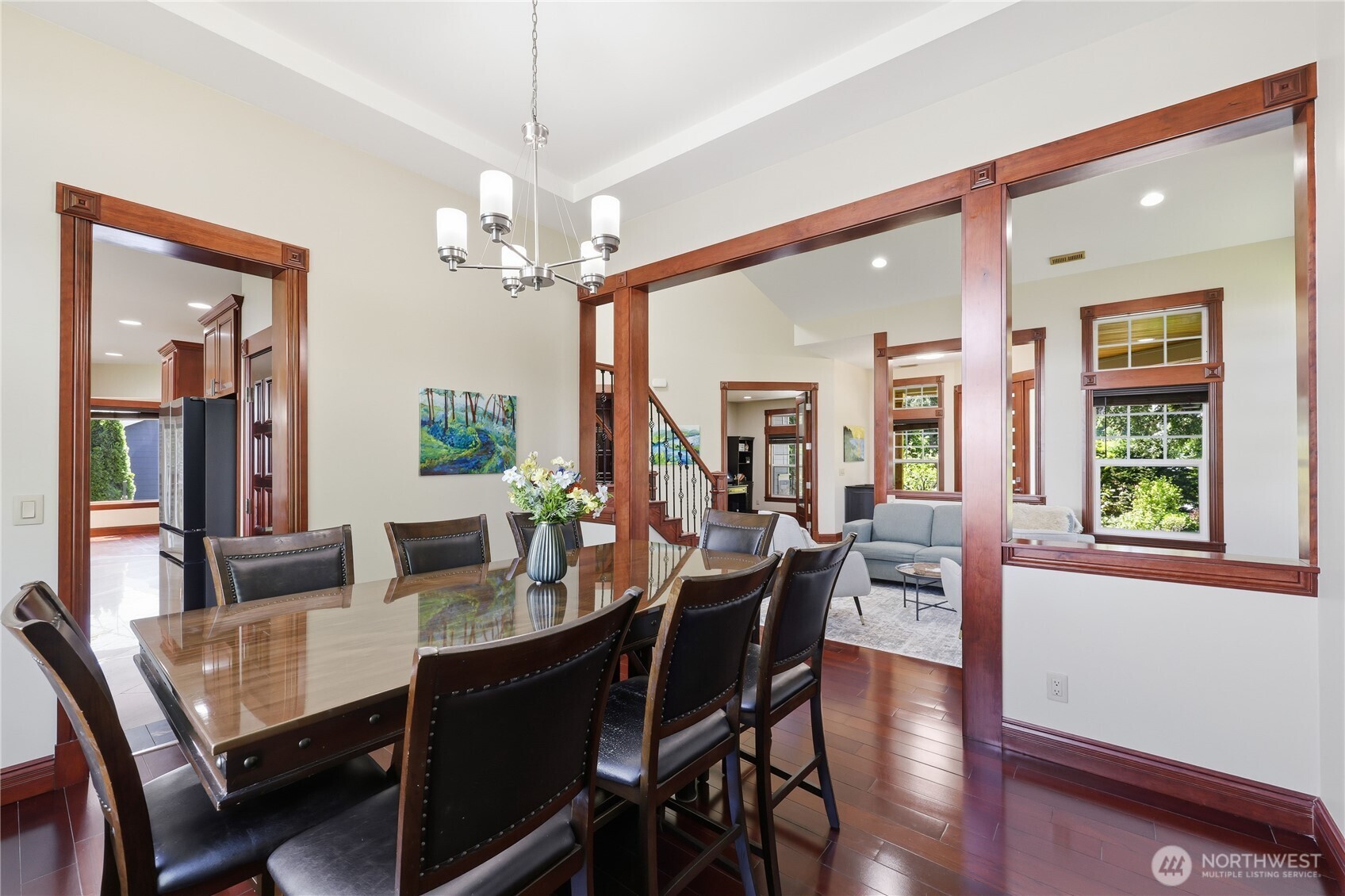 1411 Thorndyke Road Port Ludlow, WA 98365 - Photo 13 of 40 a view of a dining room with furniture window and wooden floor