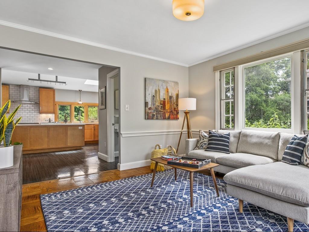 41 Lila Road Boston, MA 02130 - Photo 11 of 39 a living room with furniture and a table