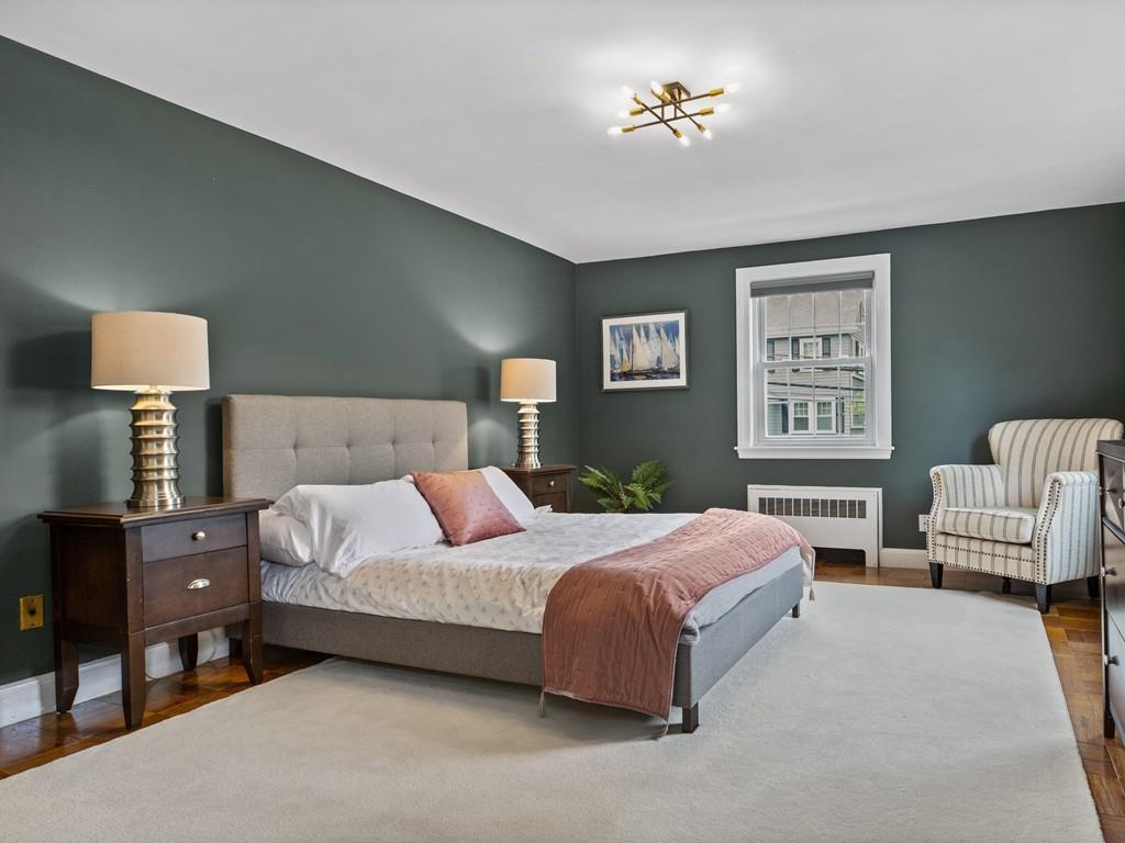 41 Lila Road Boston, MA 02130 - Photo 13 of 39 a bedroom with a bed and a couch