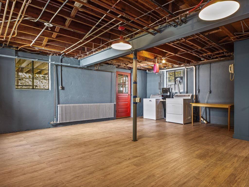 41 Lila Road Boston, MA 02130 - Photo 24 of 39 a view of an empty room with wooden floor